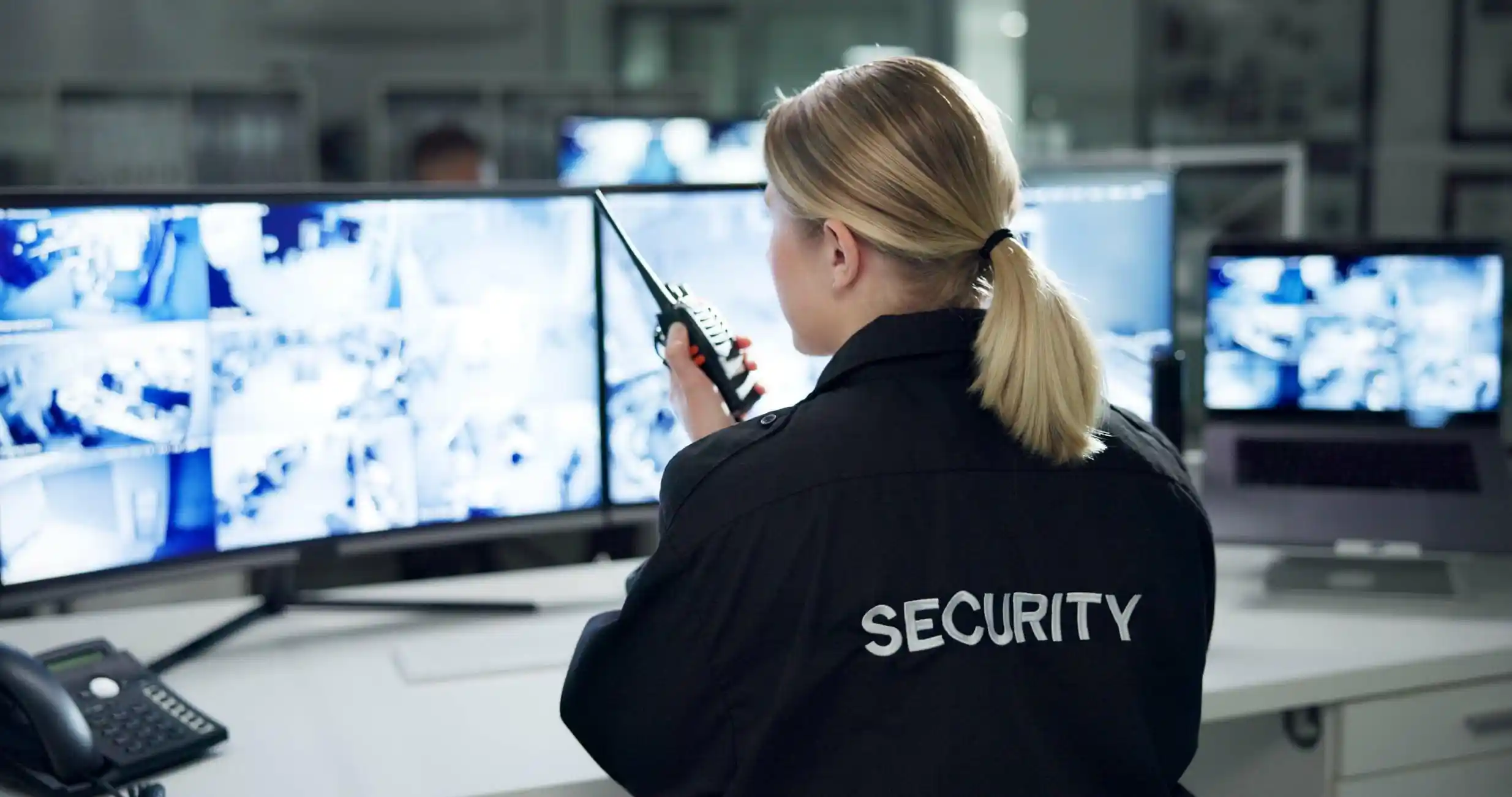 communication-security-and-woman-with-radio-cctv-2026-01-09-10-03-28-utc